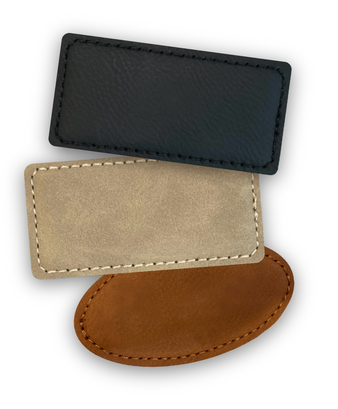 Three leather name tag blanks in black, tan, and brown rectangles